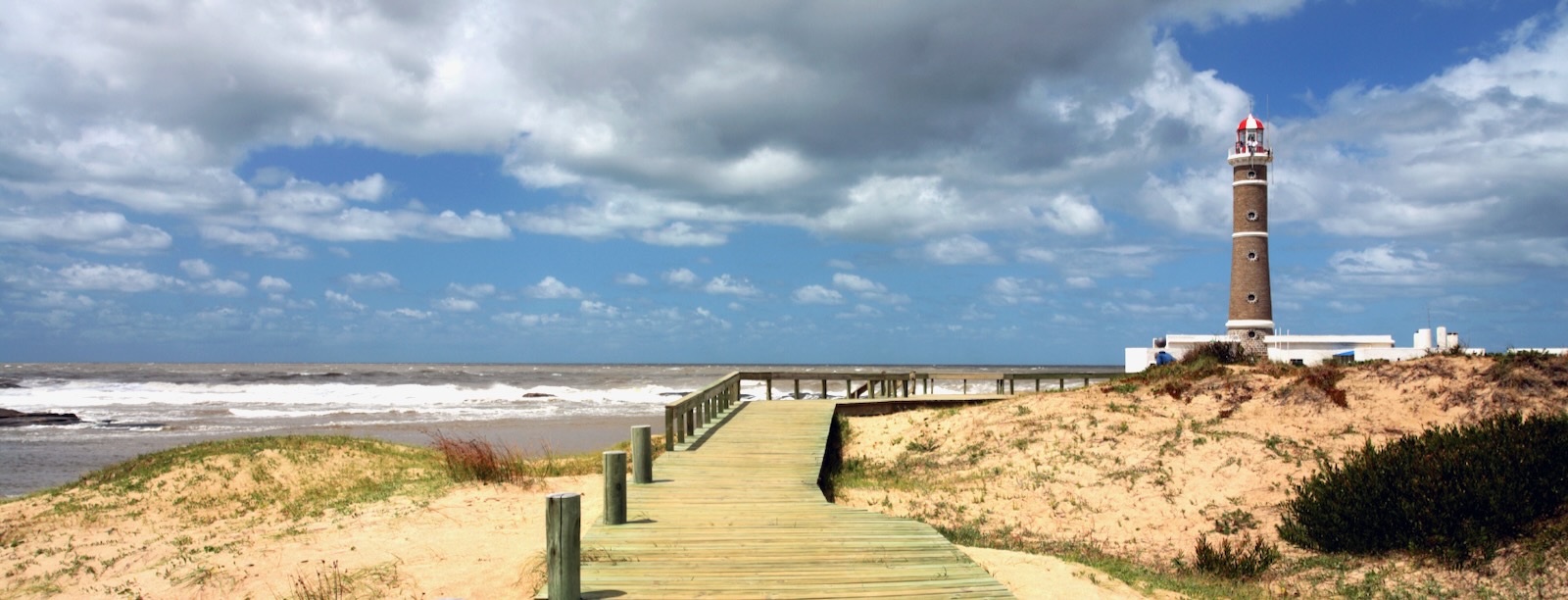 Lighthouse on coast with beach in Uruguay